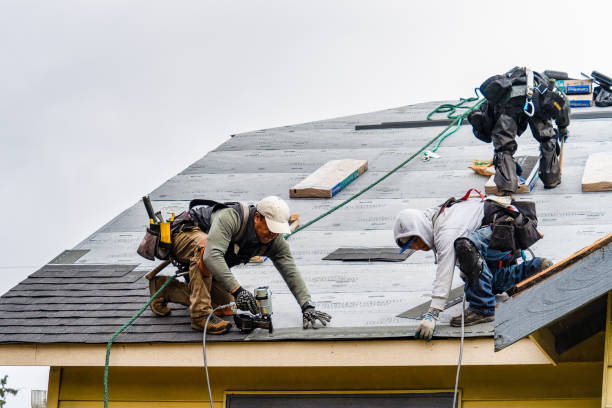 Professional Roofing technician working in Bradford, RI